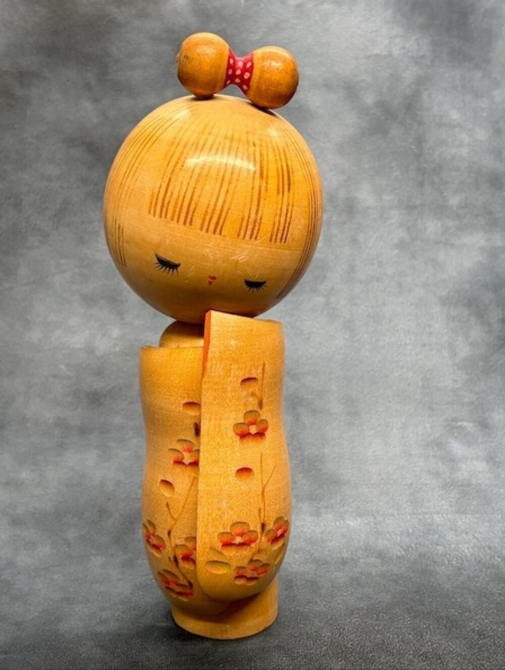 Wooden Kokeshi Figurine with Red Floral Accents